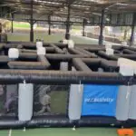 Proactivity mobile inflatable maze activation set up inside an undercover community sports center venue