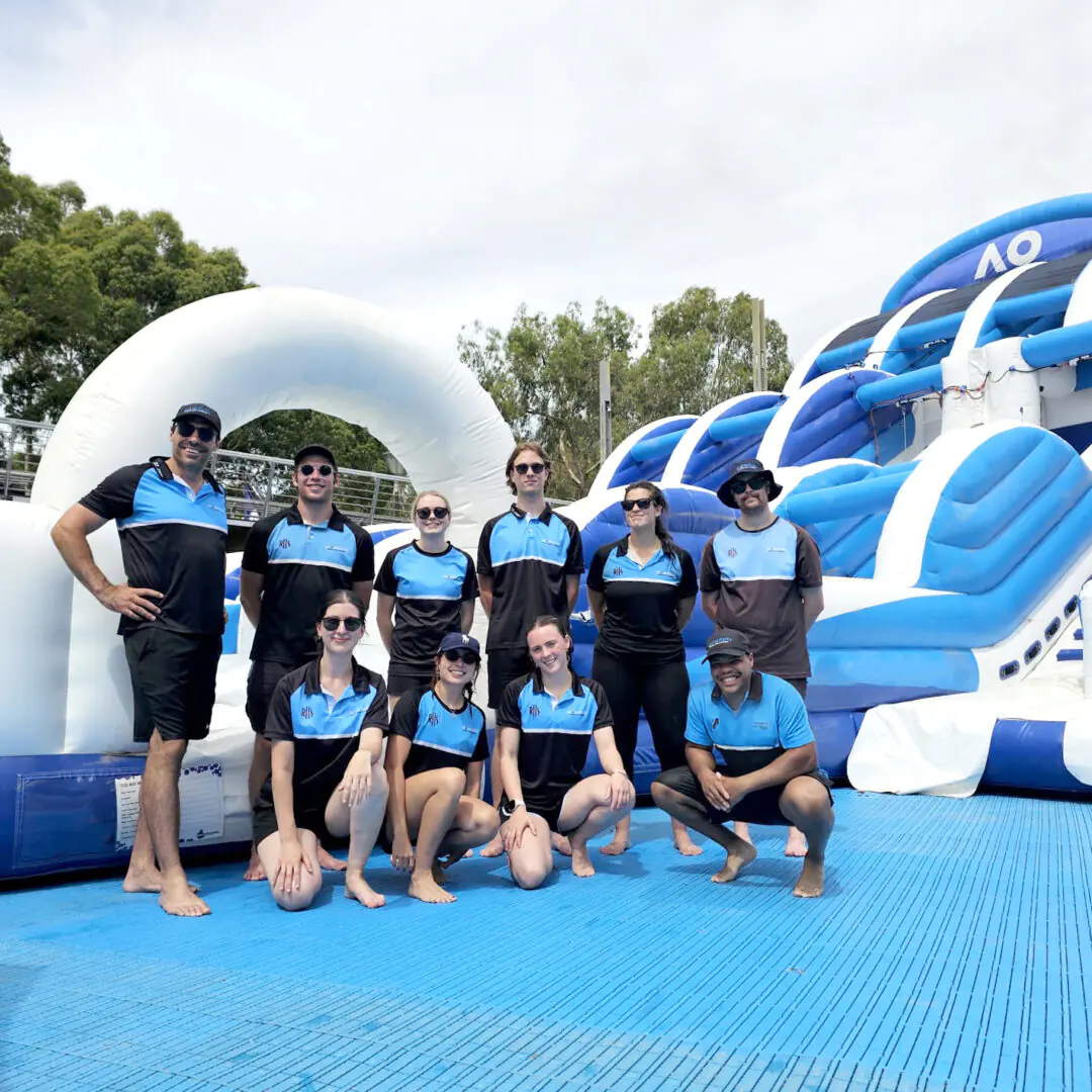 The Proactivity crew with the custom-branded Australian Open inflatable slide